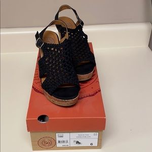 Size 6 black wedges. $20